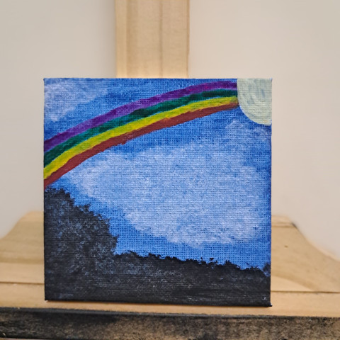 Rainbow touches dusk